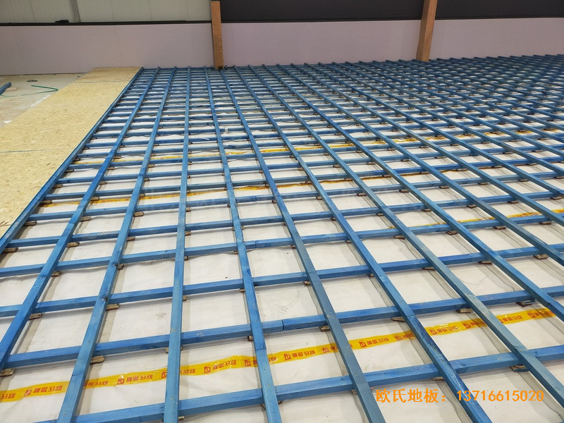 山東北環路平安行駕校籃球館體育木地板施工案例2